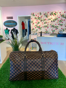 Brown Checkered Luggage Bag